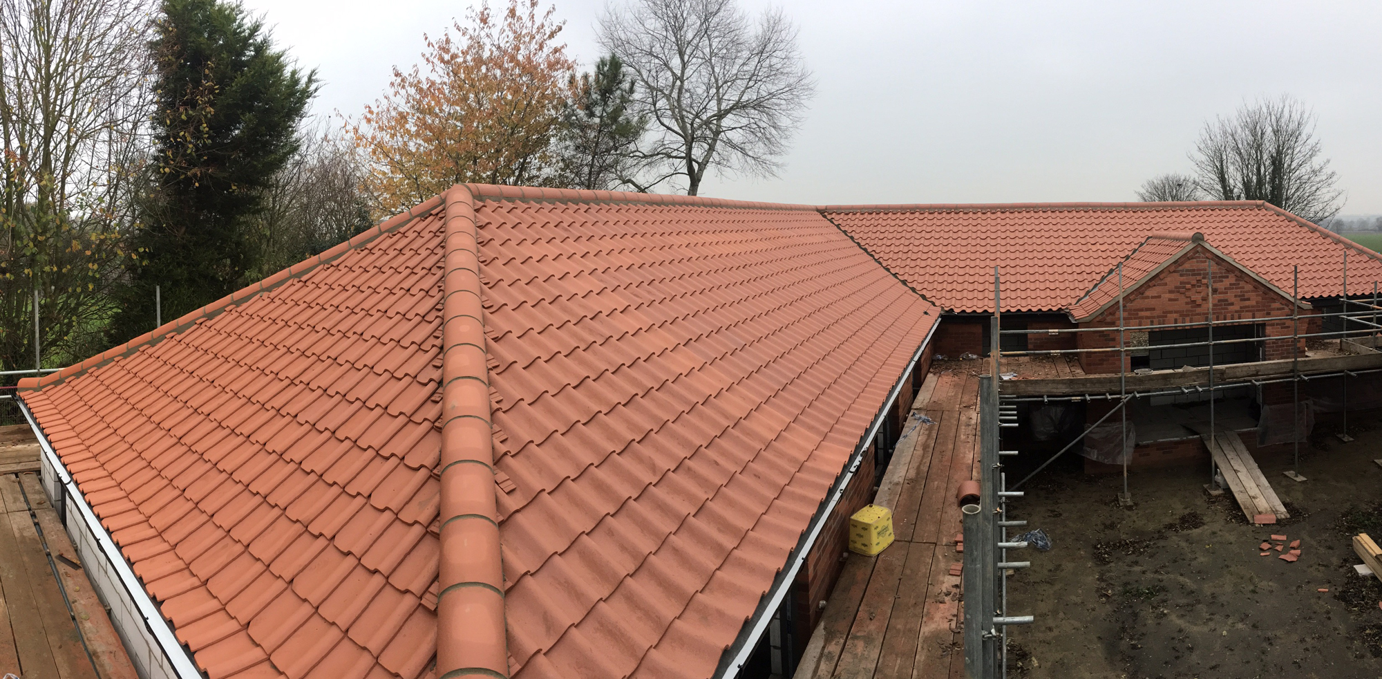 New tiled roof and ridge work